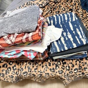 Stack of L/XL women’s clothes